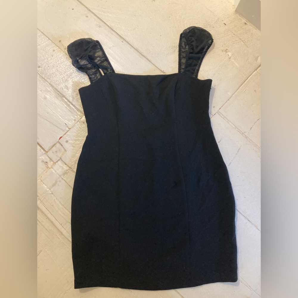 Bcbg new little black dress size 12 mini cut out back